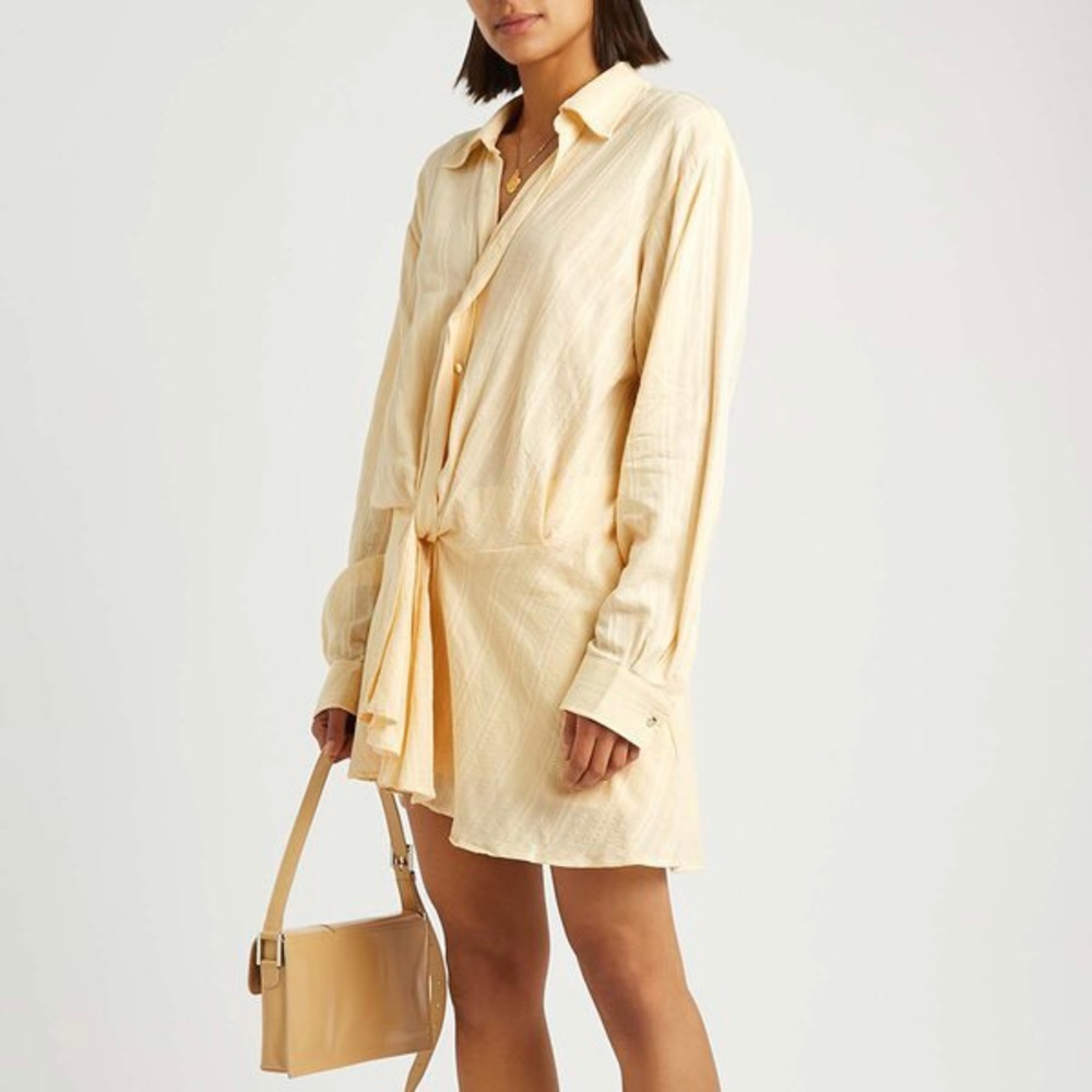 Free People Tara Twist mini dress. 💛